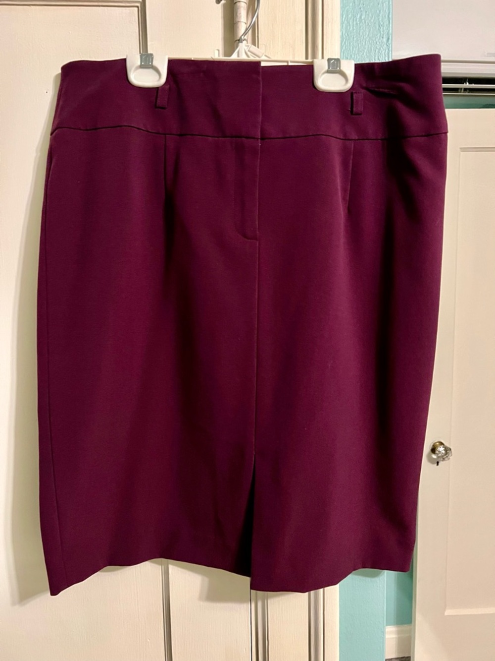Calvin Klein Plum Pencil Skirt, size 12, knee length, slit in front.